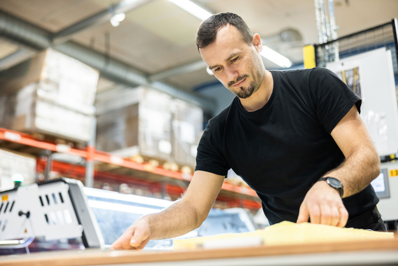 Man overlooking production